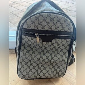 Gucci monogram backpack